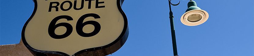 a sign and a lamp post
