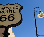 a sign and a lamp post
